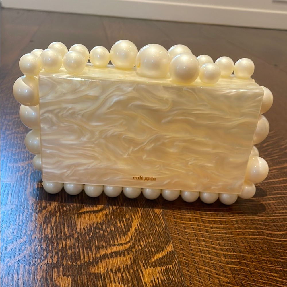 Cult Gaia Marbled Cream Clutch